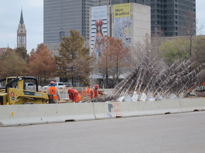 The crew prepares the River Birch trees for planting.